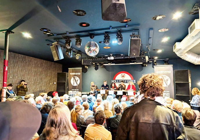 Under the disco ball, a clash over who will really help people find somewhere to live Hustings room
